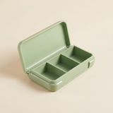 Naveya Daily Case in sage green on a Bone background